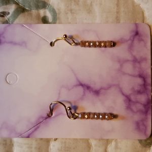 Gold and tan beaded earrings